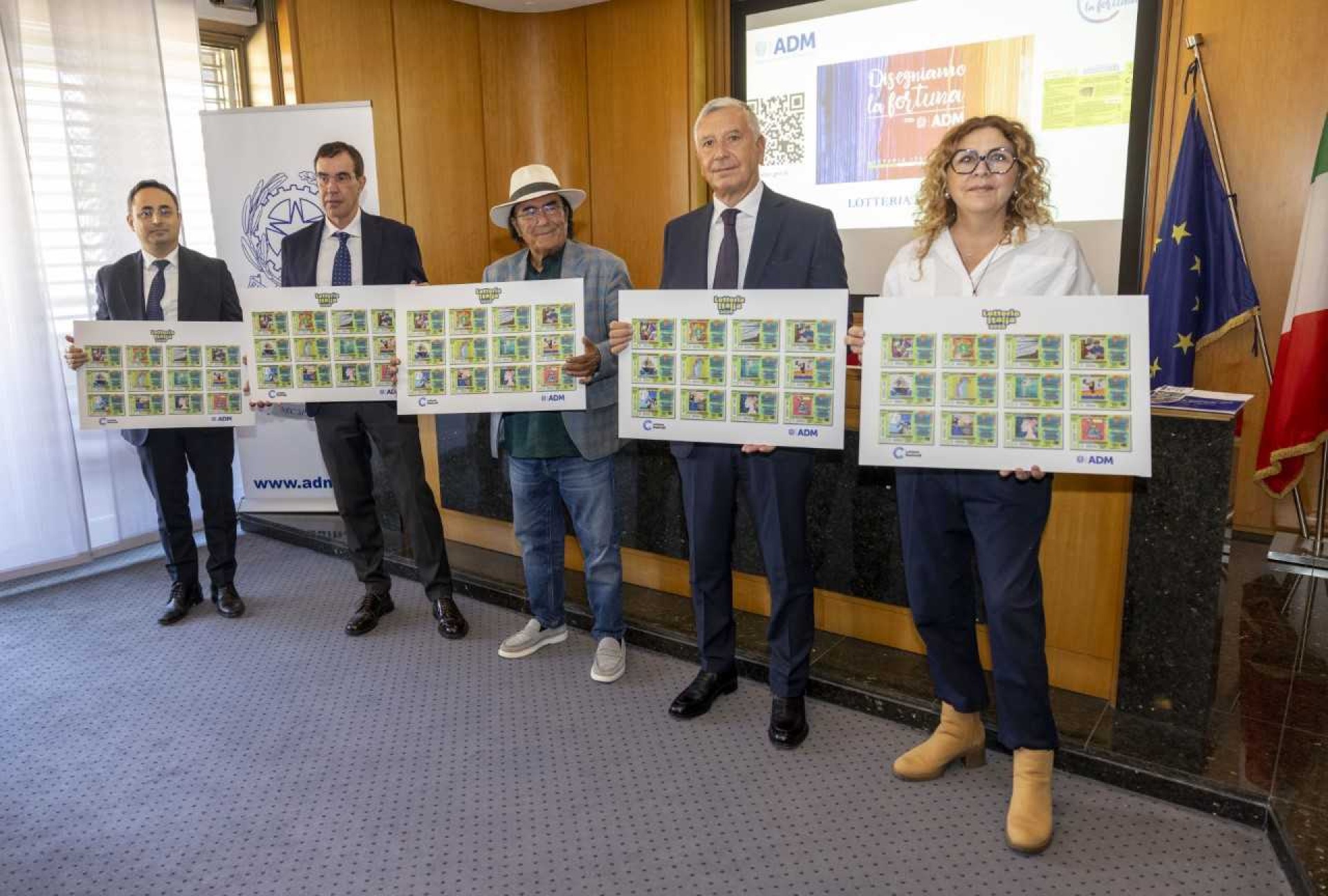 “Disegniamo la Fortuna con ADM”: inclusione e solidarietà per la Lotteria Italia 2026, premiazione degli artisti con Al Bano